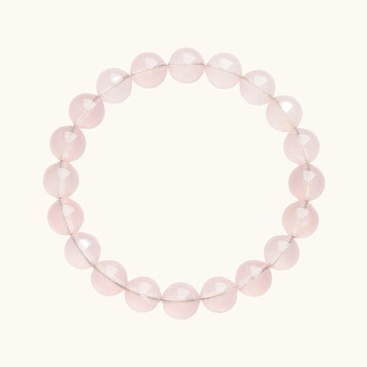 Simple and elegant rose quartz bead bracelet, perfect for fostering unconditional love and emotional healing.